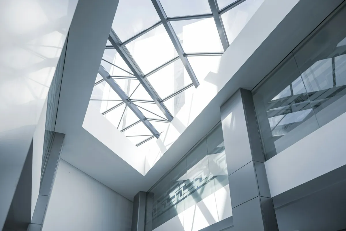 Glass skylight with steel frame seen from inside a building
