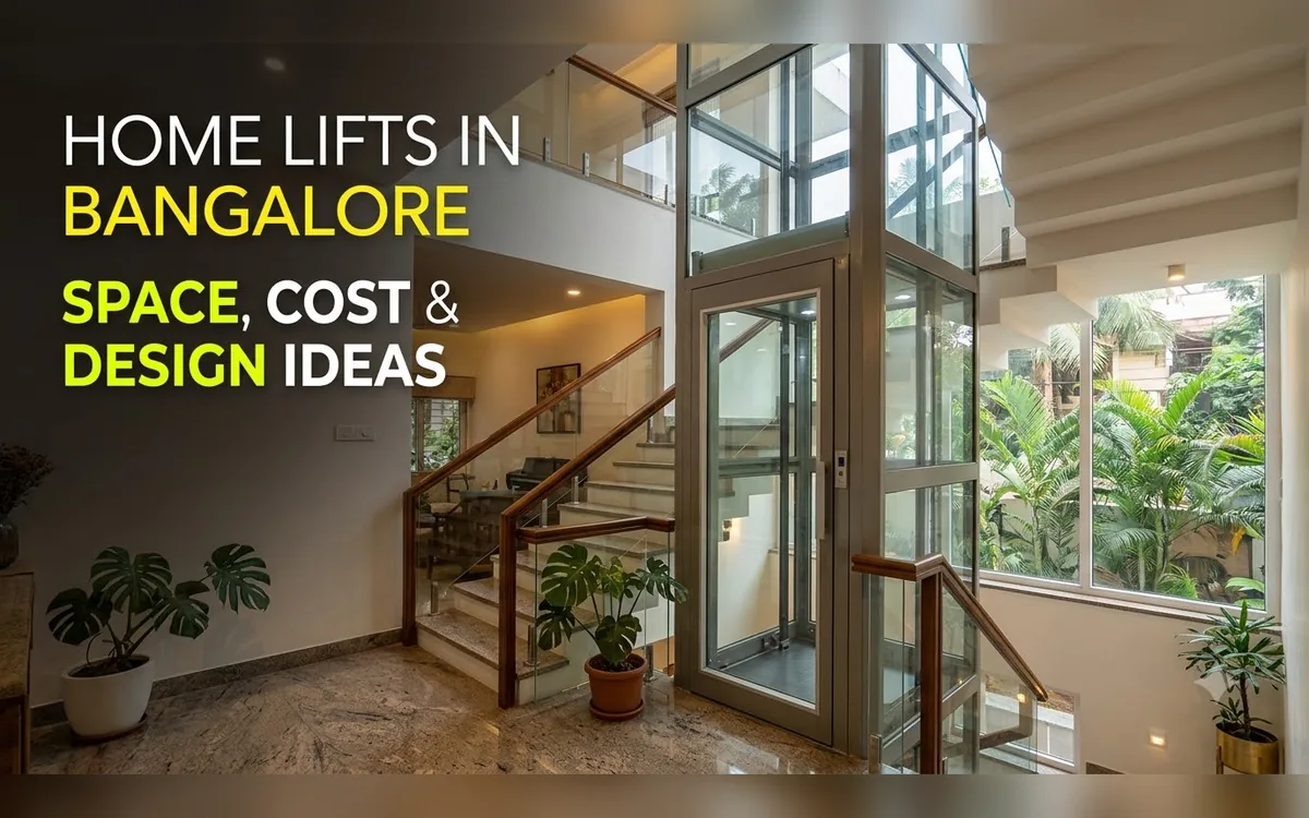 Glass home lift beside a staircase with indoor plants in a Bangalore house