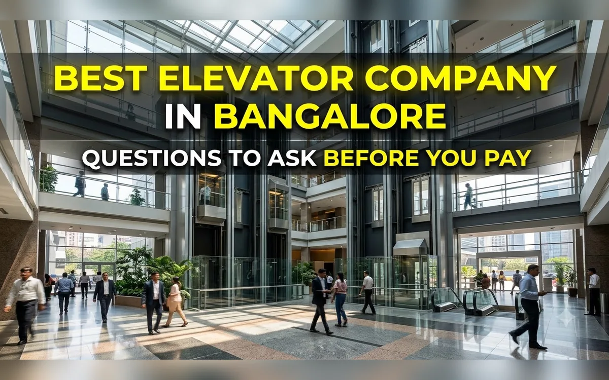 Busy glass atrium with lifts and walkways in a Bangalore commercial building