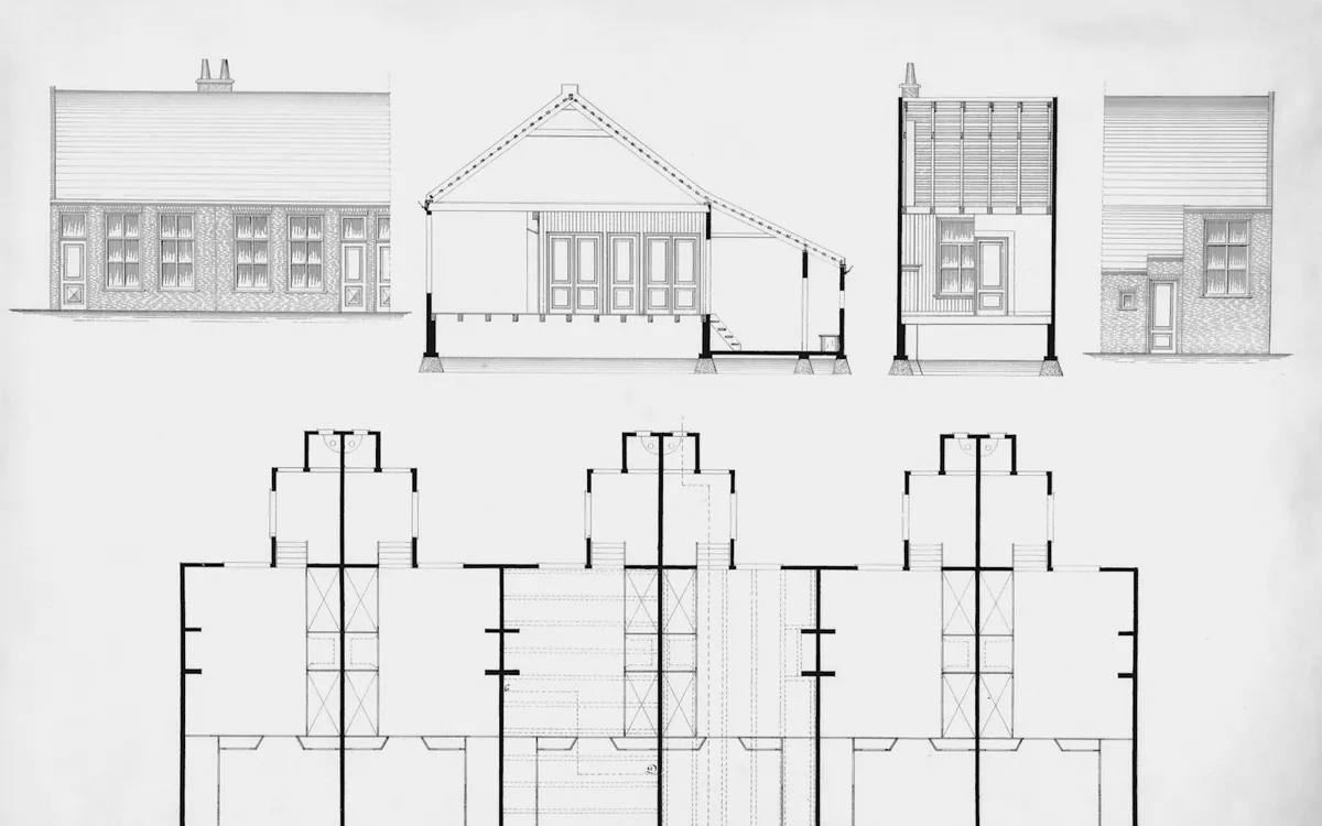 Architectural elevations and floor plans of a small building on grey paper