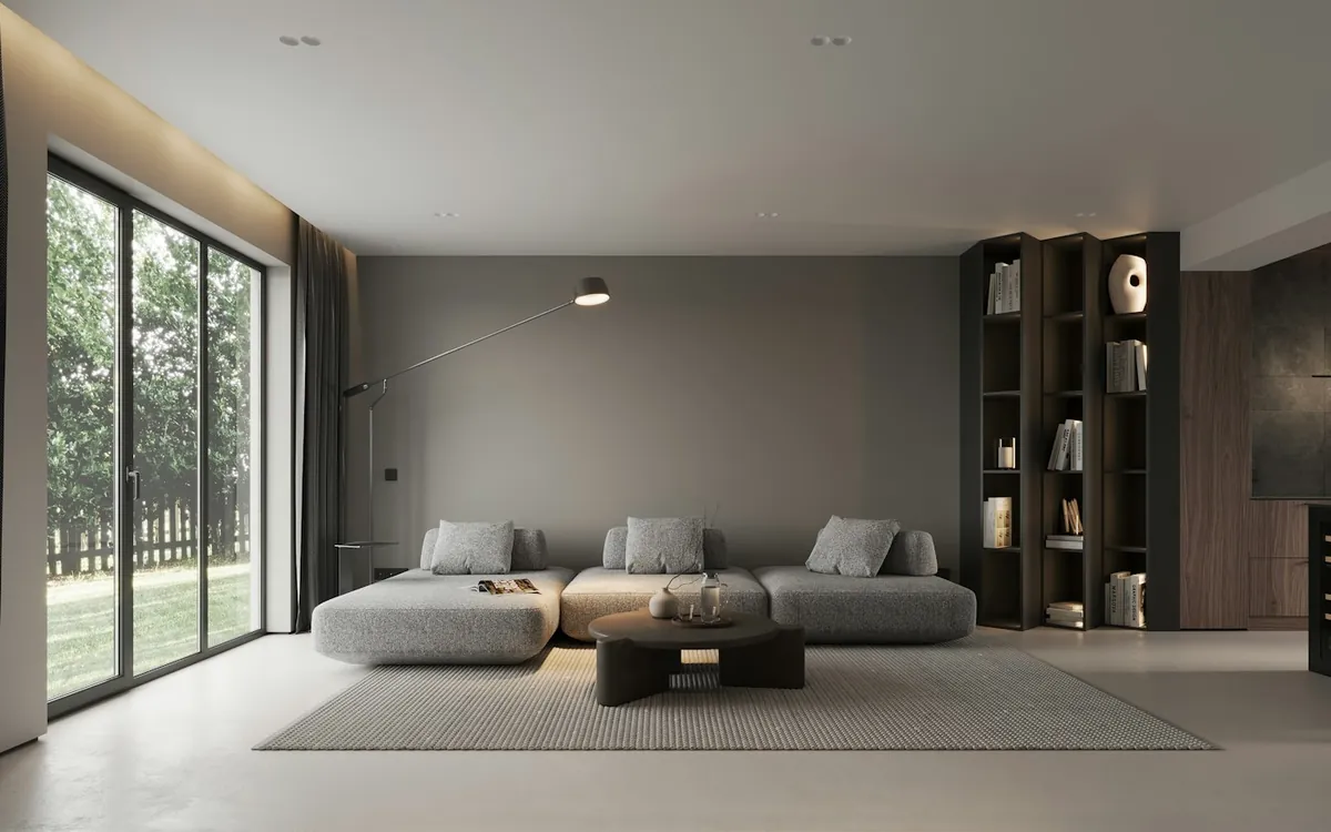 Bright modern living room with a grey sofa and large garden windows
