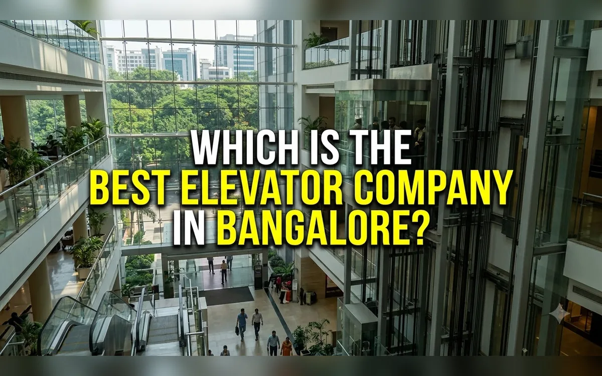 Bright atrium with glass lifts and escalators in a Bangalore commercial building