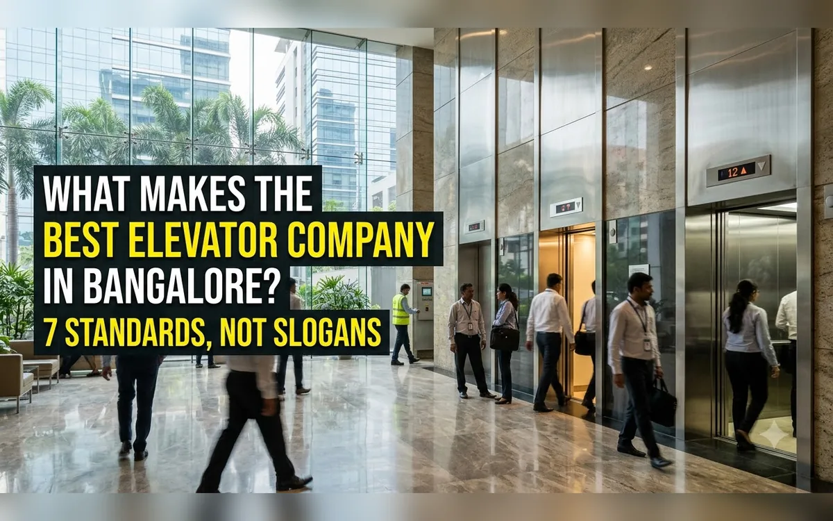 Office lobby with passengers walking past stainless steel lifts in a Bangalore building